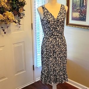 Lizzatti black white floral sleeveless ruffle hem dress crisscross bodice S EUC…